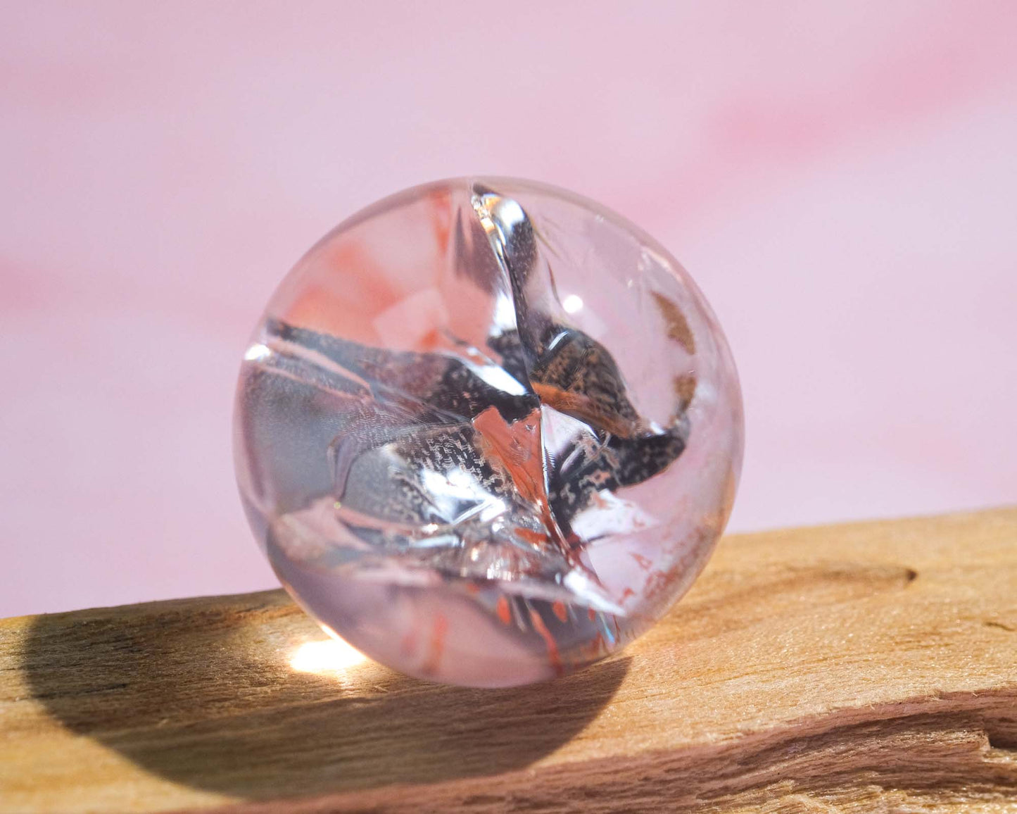 Clear Quartz Sphere with Red Hematoid Inclusion