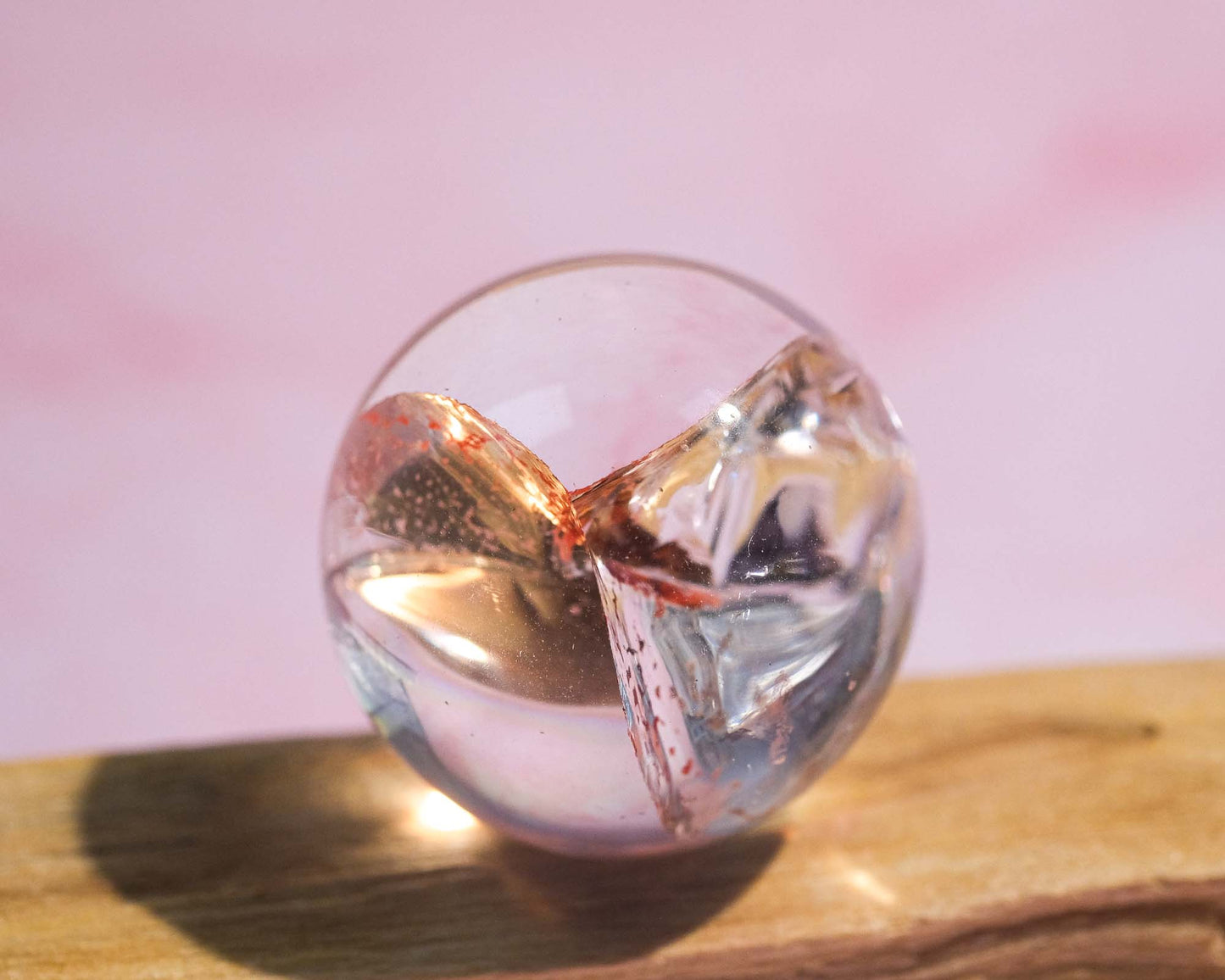 Clear Quartz Sphere with Red Hematoid Inclusion