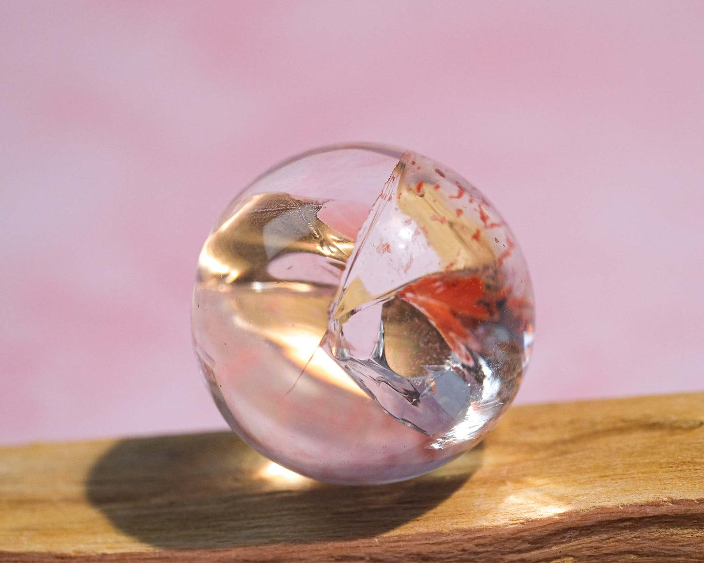 Clear Quartz Sphere with Red Hematoid Inclusion